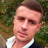 Александр Николаев
